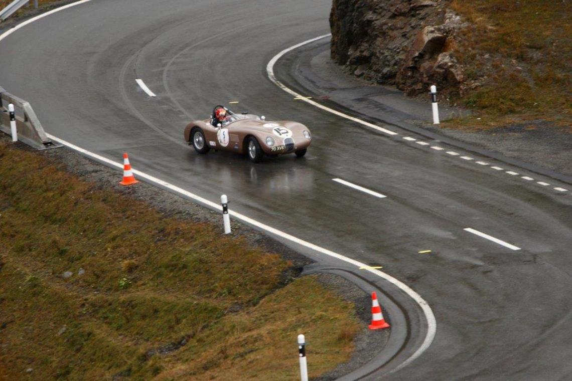 The Jaguar C-Type of Chris Ward tackles the winding mountain pass to finish second overall in the 2015 Bernina Granturismo