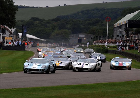 Andy Wallace gets a strong start off the grid for the Whitsun Trophy race as he leads the pack of GT40s off the line 