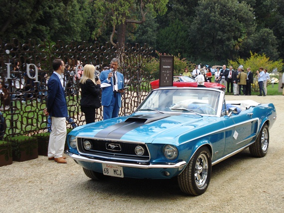 The 1968 Ford Mustang GT Convertible in front of the judging panel