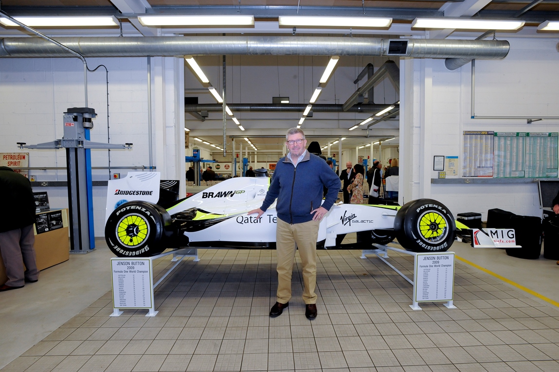 One of many great acheivements; Ross Brawn OBR stands next to his 2009 Formula 1 Championship winning Brawn GP Team car