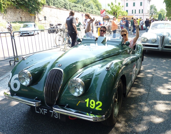 Singer Eliott Gleave (aka Example) and wife Erin successfully complete the 2014 Mille Miglia in the Jaguar Heritage XK120