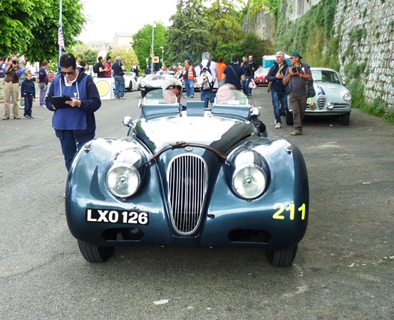 Chat show host Jay Leno takes to the drivers seat of the Ecurie Ecosse Jaguar XK120